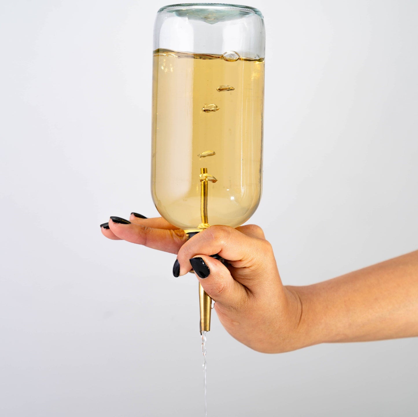 A Bar Above Black Pour Spouts