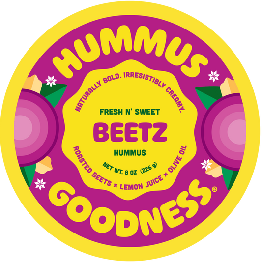 Hummus container with 'Fresh N' Sweet Beetz Hummus' branding on a white background