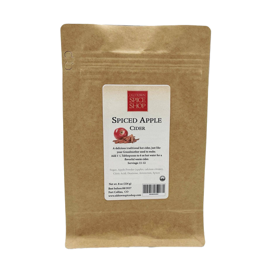 Kraft paper package of Spiced Apple Cider from Old Fashioned Spice Shop on a white background