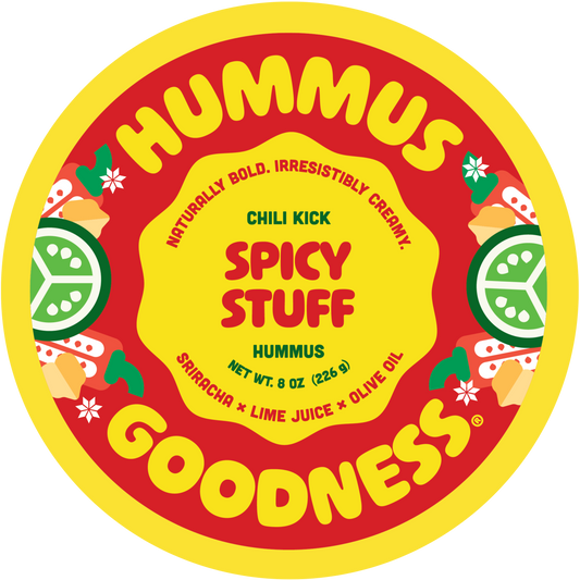 Hummus container with 'Spicy Stuff' flavor on a red and yellow background